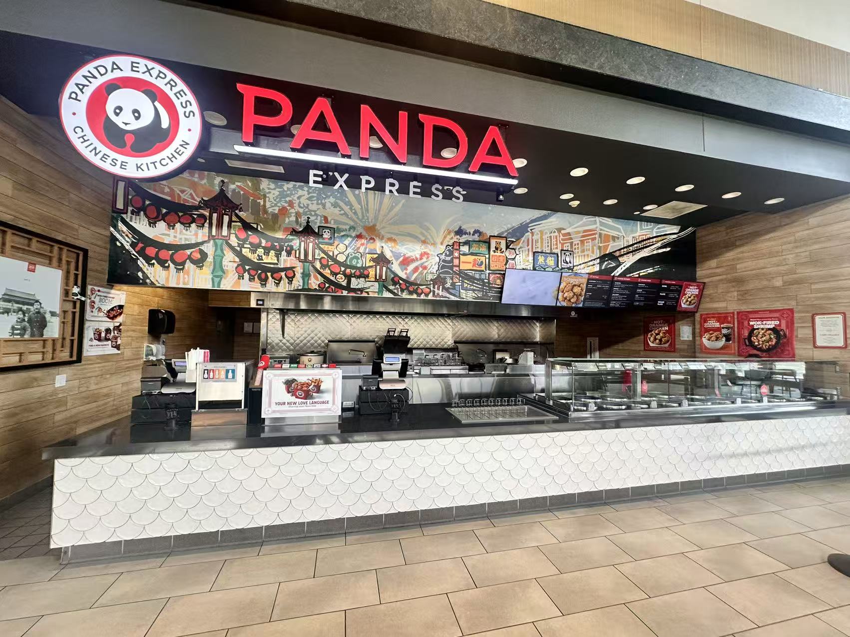 Panda Express counter and branded storefront in a food court